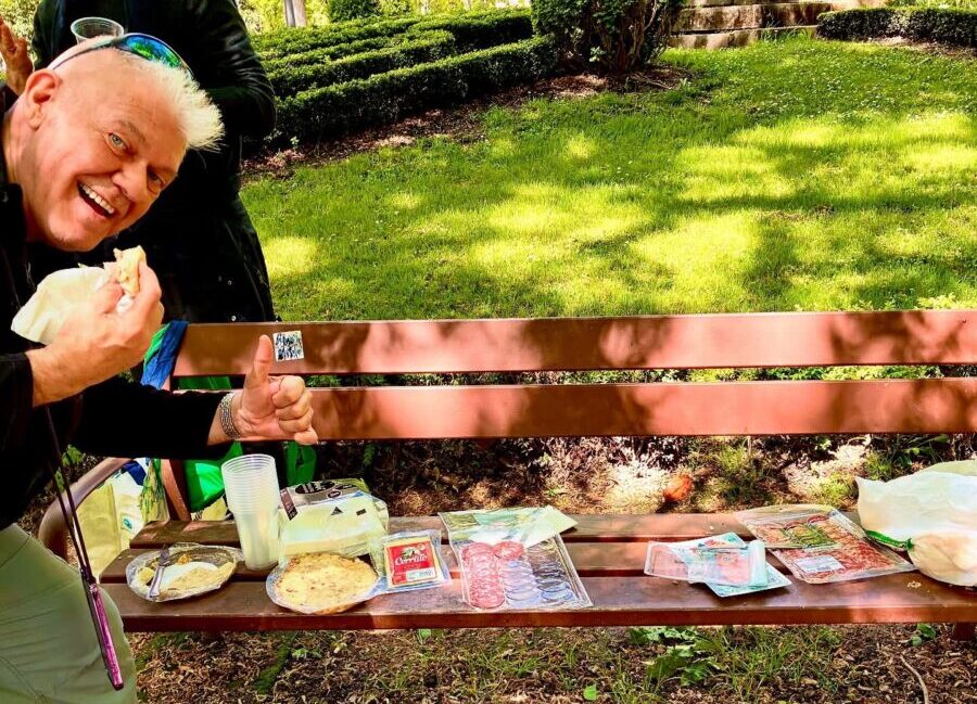 Picnic supplies on a park bench