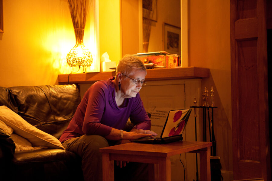 A woman working on a laptop