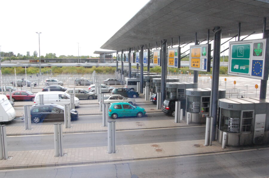 Cars at an immigration line in Europe.