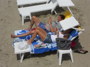 Europe's beaches are a little less relaxing these days as so many people are playing with their iPhones while sunbathing.
