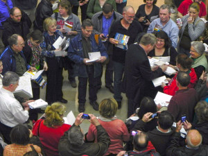 Travelers gather outside Rick's talk in Westerville, Ohio (just outside of Columbus), to get a guidebook autographed.