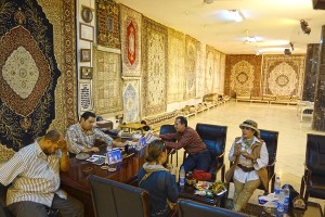 In former times, the carpet shops that line the road leading to the pyramids were jammed with tour groups. Today, they are literally empty.