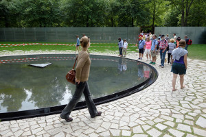 Sightseers visit Berlin's new memorial honoring the Roma and Sinti (Gypsy) victims of Hitler's genocide.