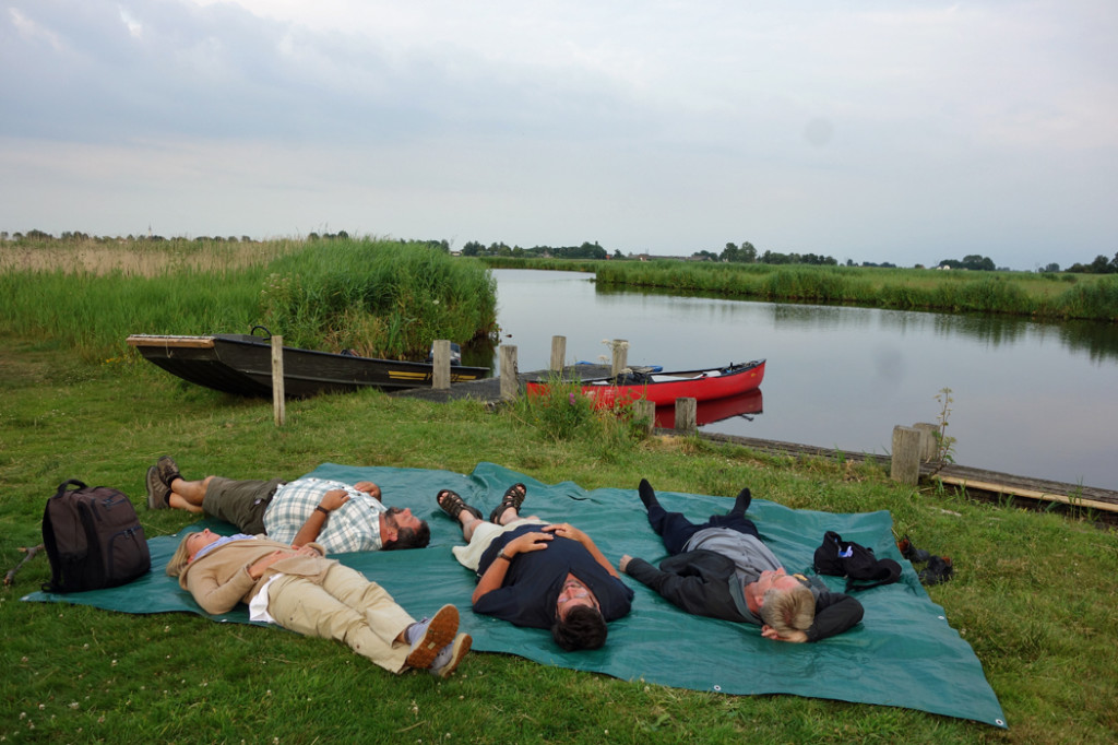 Rick-Steves-crew-sleeping-on-lake
