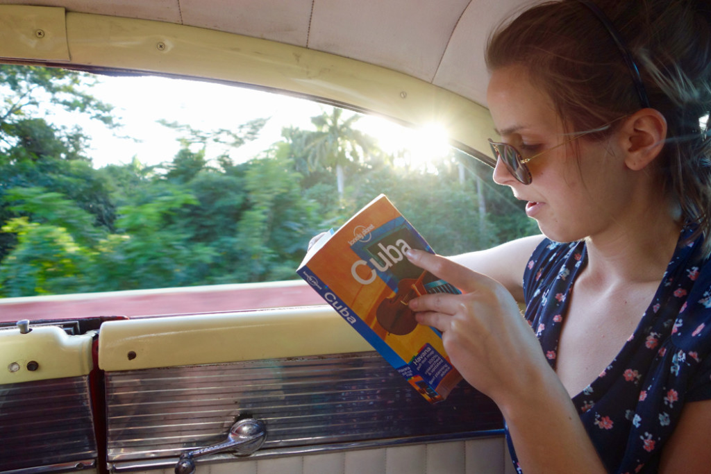 Jackie Steves reading Lonely Planet Cuba