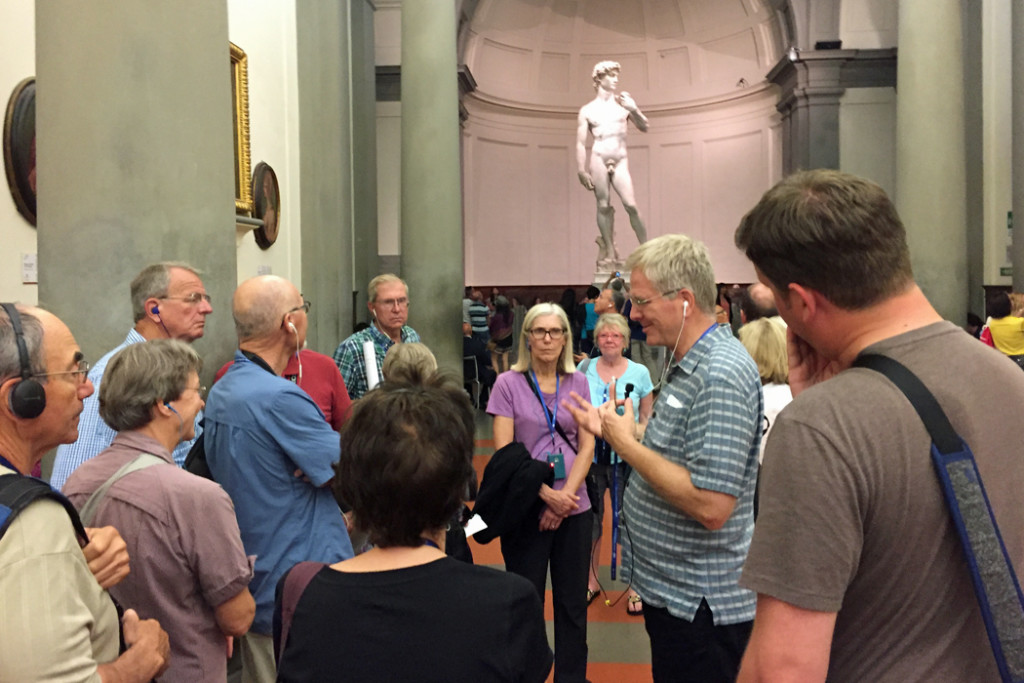 Rick Steves and tour group in front of David sculpture