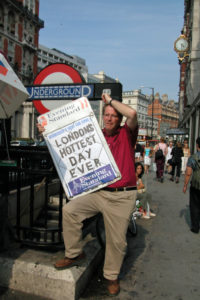 Rick Steves with "Hottest Day Ever" newspaper