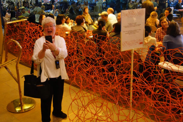 excited woman with phone