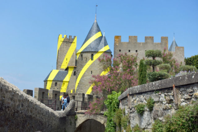 bright yellow lines painted on medieval carcassonne tower