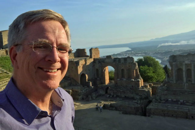 Rick Steves selfie in ancient Greek amphiteatre